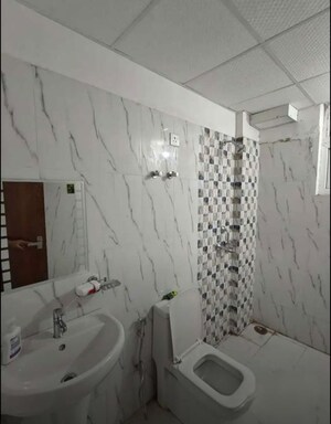 Bathroom in 3 BHK Apartment at Sultanpur Road – for Rent