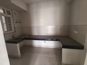 Kitchen in 3 BHK Apartment at Samridhi Luxuriya Avenue, Sector 150 – for Rent
