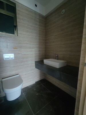 Bathroom in 3 BHK Apartment at Raj Infinia, Malad West – for Rent