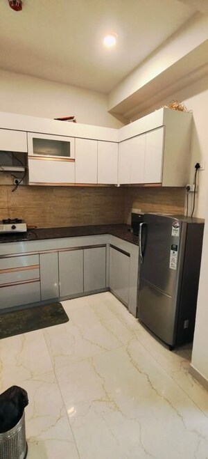 Kitchen in 2 BHK Apartment at Rishita Serenity, Sushant Golf City – for Rent