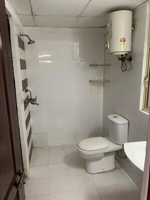 Bathroom in 3 BHK Apartment at Elite Golf Green, Sector 79 – for Rent