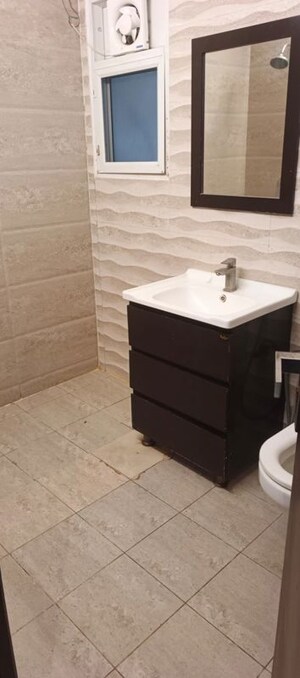 Bathroom in 3 BHK Apartment at Elite Golf Green, Sector 79 – for Rent
