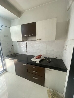 Kitchen in 1 BHK Apartment at RNA NG Canary, Mira Road – for Rent