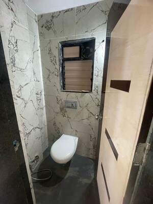 Bathroom in 1 BHK Apartment at RNA NG Canary, Mira Road – for Rent