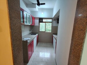 Kitchen in 2 BHK Apartment at Yashodha Apartment Kasarvadavali, Kasarvadavali – for Rent