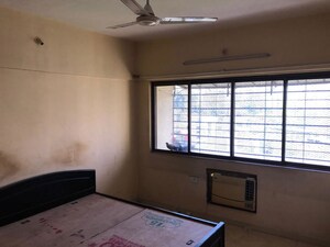 Room in 2 BHK Apartment at Globe Heights, Goregaon East – for Rent