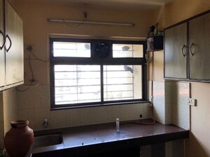 Kitchen in 2 BHK Apartment at Globe Heights, Goregaon East – for Rent