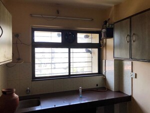 Kitchen in 2 BHK Apartment at Globe Heights, Goregaon East – for Rent
