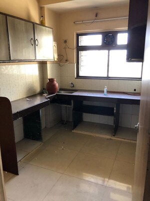 Kitchen in 2 BHK Apartment at Globe Heights, Goregaon East – for Rent