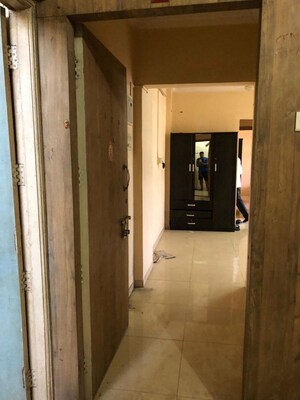 Building Lobby in 2 BHK Apartment at Globe Heights, Goregaon East – for Rent