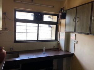Kitchen in 2 BHK Apartment at Globe Heights, Goregaon East – for Rent