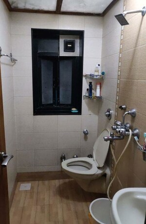 Bathroom in 3 BHK Apartment at Meenaxi Towers, Gokuldham Colony – for Rent