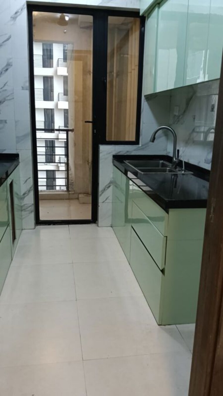 Kitchen, risland-the-icon 3 Bedroom 940 Sq.Ft. Apartment In Dhokali Thane 10582995
