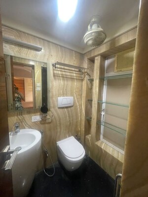 Bathroom in 4 BHK Apartment at Khar West – for Rent
