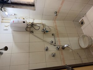 Bathroom in 1 BHK Apartment at Himgiri Lokupvan Phase II CHS Ltd, Vasant Vihar – for Rent