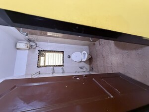 Kitchen in 2 BHK Apartment at Shree Satya Shankar Residency, Manpada – for Rent