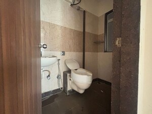 Bathroom in 2 BHK Apartment at Puranik Tokyo Bay Phase 2A, Kasarvadavali – for Rent