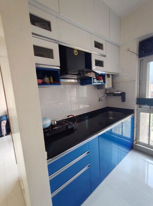Kitchen in 1 BHK Apartment at Vijay Orovia, Ghodbunder Road – for Sale