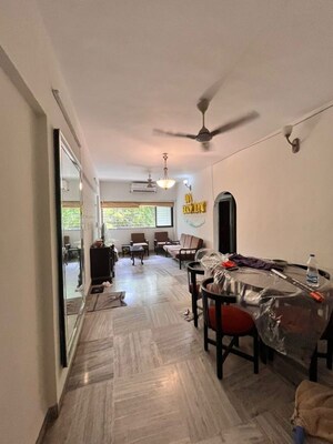 Living Room in 2 BHK Apartment at Juhu – for Rent