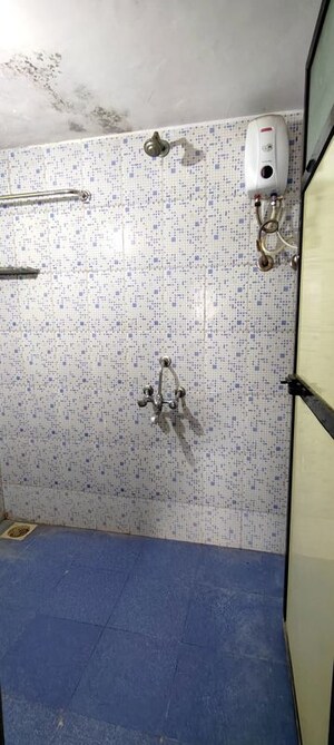 Bathroom in 1 BHK Apartment at Kings Anand Dham, Nahur East – for Rent