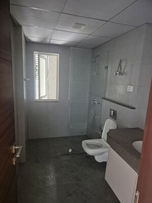 Bathroom in 4 BHK Apartment at Godrej Meridien, Sector 106 – for Sale