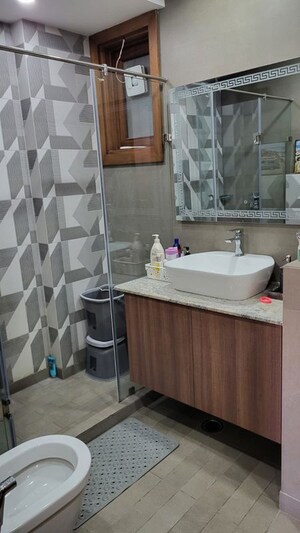 Bathroom in 4 BHK Apartment at Greater Kailash I – for Sale