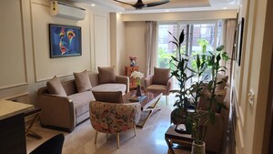 Living Room in 4 BHK Apartment at Greater Kailash I – for Sale