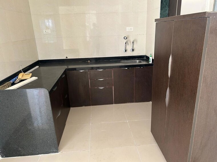 Kitchen, vikram-midori-towers 2 Bedroom 950 Sq.Ft. Apartment In Pimple Nilakh Pune 10583318