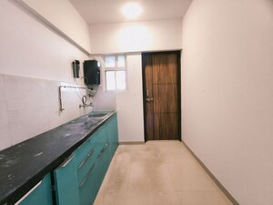 Kitchen in 1 BHK Apartment at Nyati Defence Enclave, Undri – for Rent