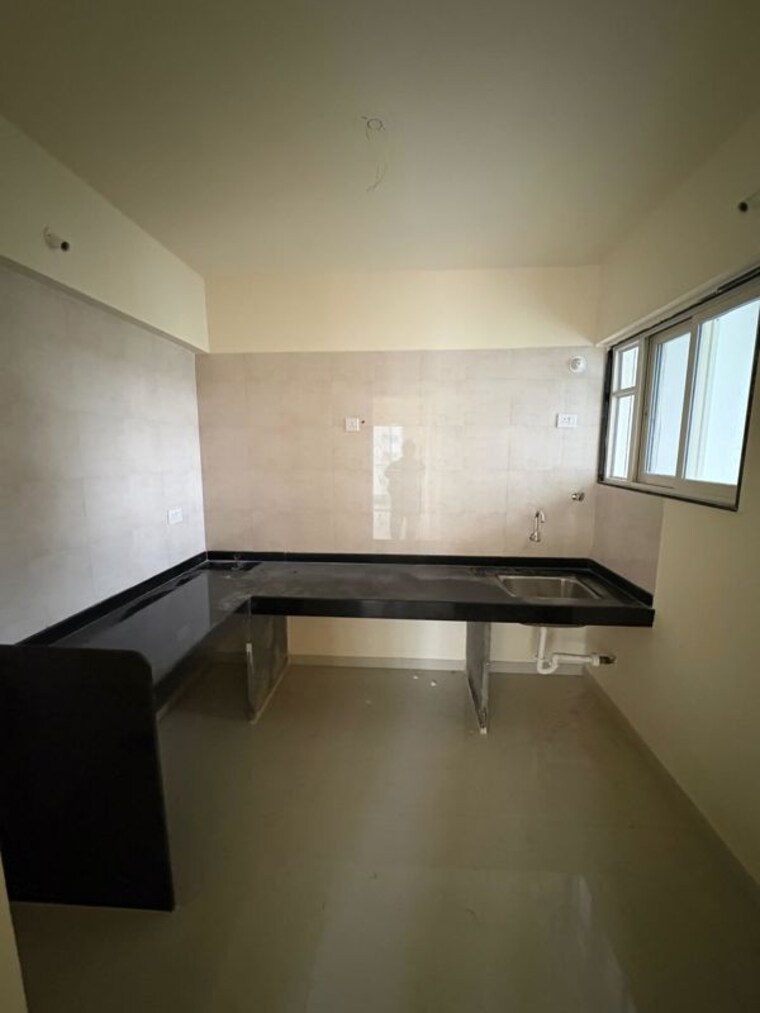 Kitchen, pharande-felicity-cluster-a 2 Bedroom 1100 Sq.Ft. Apartment In Ravet Pune 10583367