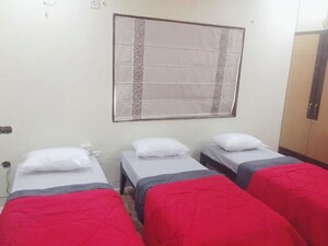 Bedroom in  Pg at Rambaug Colony – for Rent