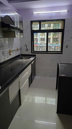 Kitchen in 2 BHK Apartment at Agarwal Vrindavan Gardens, Nalasopara East – for Sale