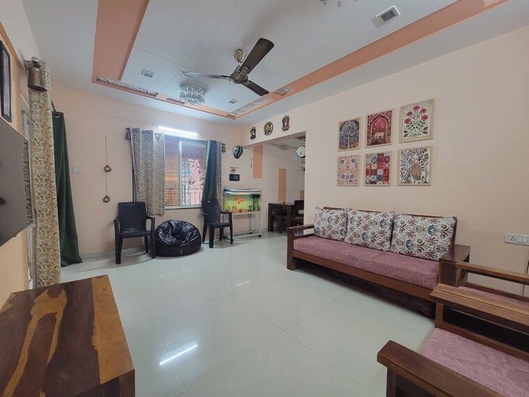 Living Room, gk-royale-rahadki-greens-phase-2 3 Bedroom 1050 Sq.Ft. Apartment In Rahatani Pune 10583451