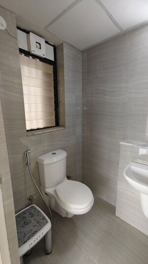 Bathroom in 1.5 BHK Apartment at Runwal Gardens, Dombivli East – for Rent