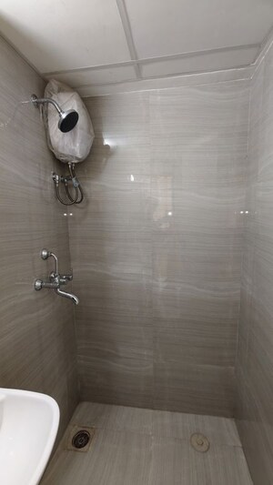 Bathroom in 1.5 BHK Apartment at Runwal Gardens, Dombivli East – for Rent