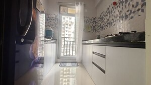 Kitchen in 1 BHK Apartment at Raunak Bliss, Ghodbunder Road – for Rent