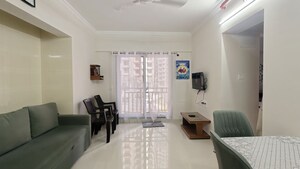 Living Room in 1 BHK Apartment at Raunak Bliss, Ghodbunder Road – for Rent