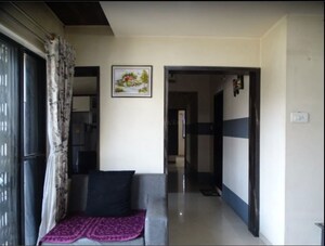 Living Room in 2 BHK Apartment at Girija Shankar Vihar Apartment, Kothrud – for Rent