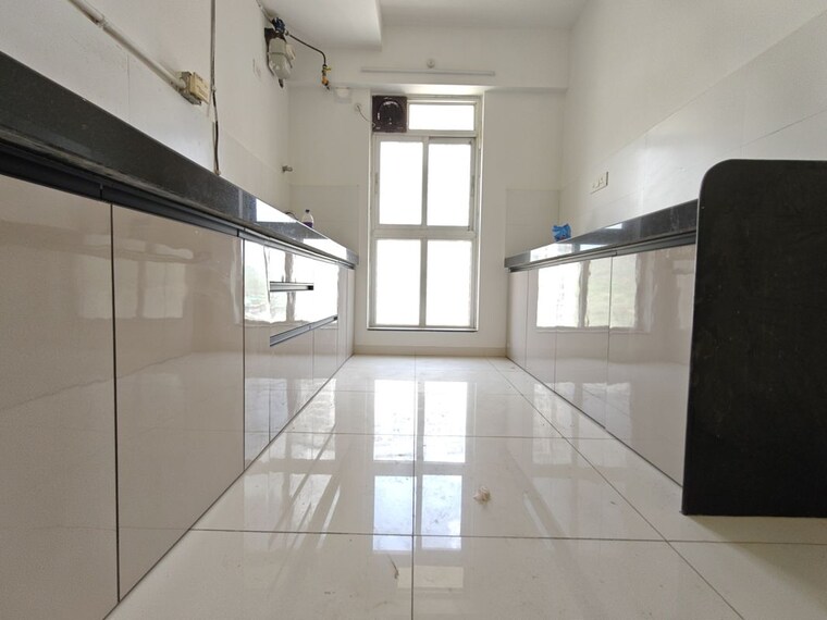 Kitchen, godrej-emerald 3 Bedroom 907 Sq.Ft. Apartment In Ghodbunder Road Thane 10583595