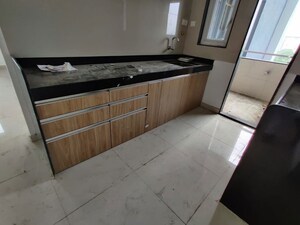 Kitchen in 3 BHK Apartment at Gokhale Anuprita, Dahanukar Colony – for Rent