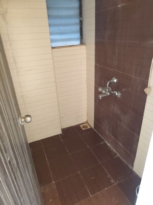 Bathroom in 1 BHK Apartment at Kavya Hill View CHS, Anand Nagar – for Sale