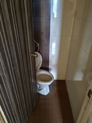 Bathroom in 1 BHK Apartment at Kavya Hill View CHS, Anand Nagar – for Sale