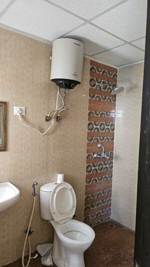Bathroom in 3 BHK Apartment at Samridhi Luxuriya Avenue, Sector 150 – for Rent