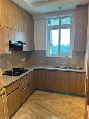 Kitchen in 3 BHK Apartment at Ambience Creacions, Sector 22 – for Sale