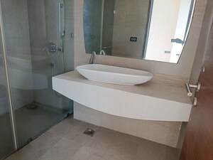Bathroom in 4 BHK Apartment at Mahagun Mezzaria, Sector 78 – for Sale