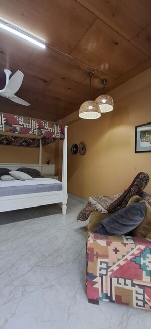 Bedroom in 4 BHK Builder Floor at Defence Colony – for Rent