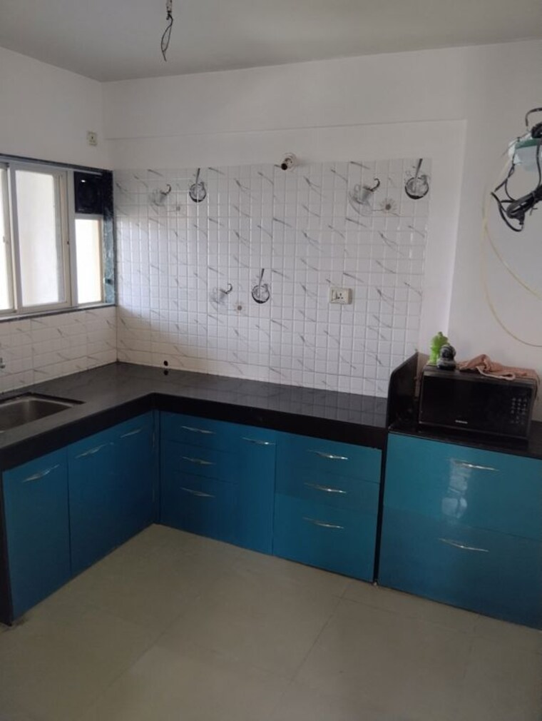 Kitchen, punawale 1 Bedroom 648 Sq.Ft. Apartment In Punawale Pune 10380793