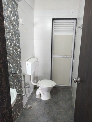 Bathroom in 2 BHK Apartment at Dosti Heritage, Karanjade – for Rent