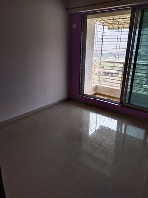 Room in 2 BHK Apartment at Dosti Heritage, Karanjade – for Rent