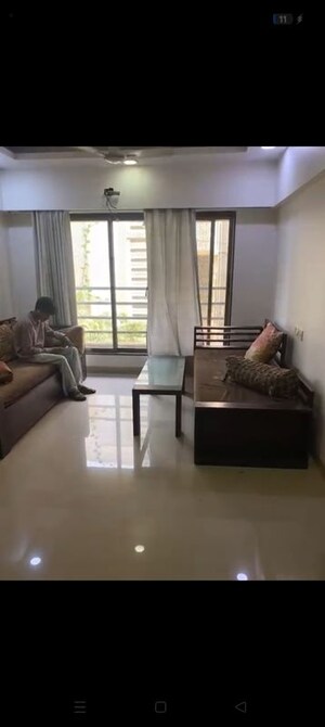 Living Room in 2 BHK Apartment at Acme Sweet 16, Andheri West – for Rent